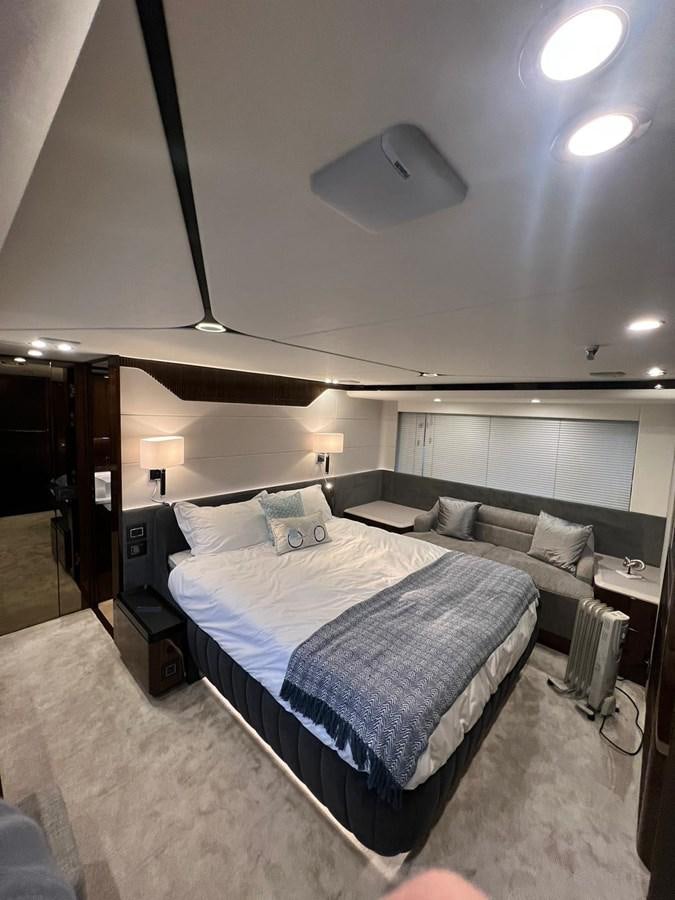 a room with a bed and a couch aboard SQUADRON 68 Yacht for Sale
