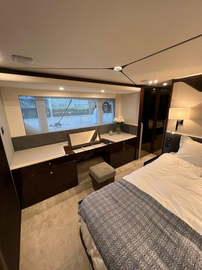 a hotel room with a large window aboard SQUADRON 68 Yacht for Sale
