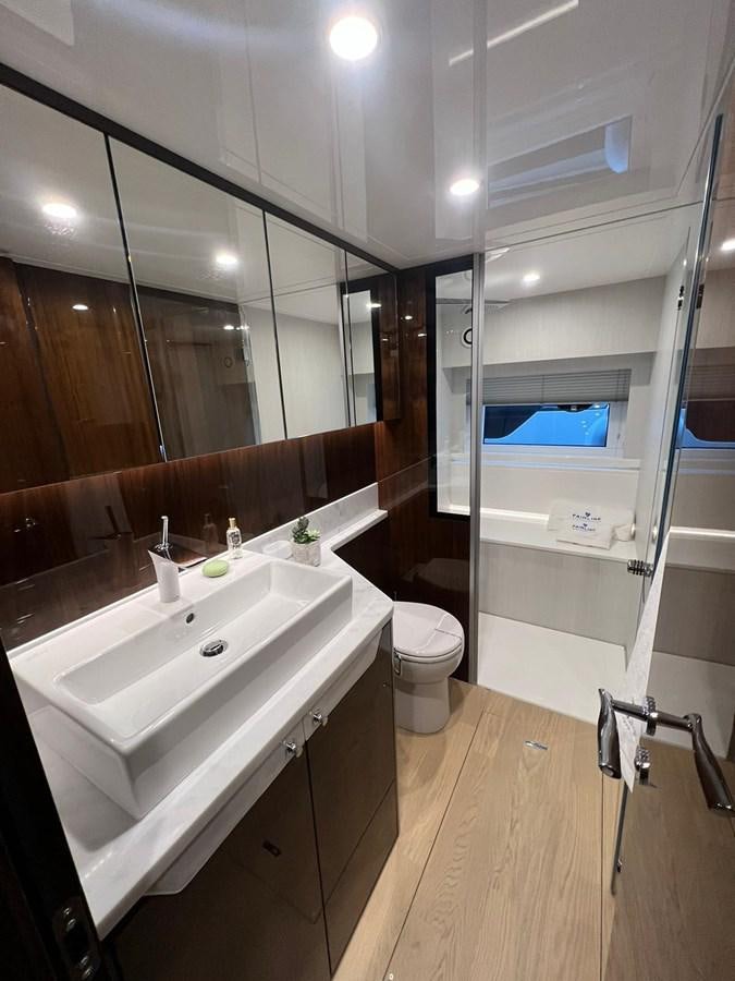 a bathroom with a sink and a toilet aboard SQUADRON 68 Yacht for Sale