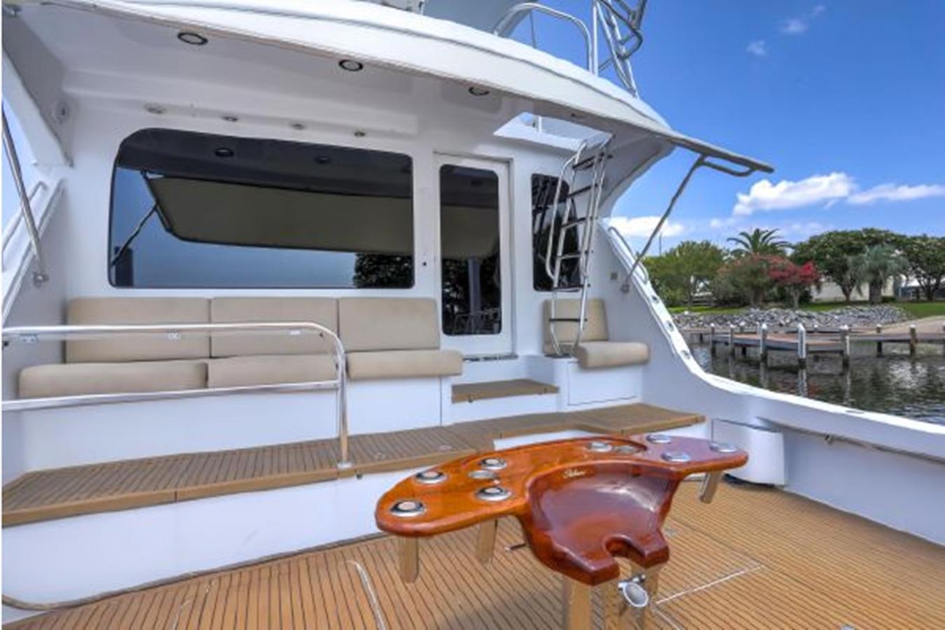 a boat on the water aboard 2007 68 HATTERAS CONVERTIBLE Yacht for Sale
