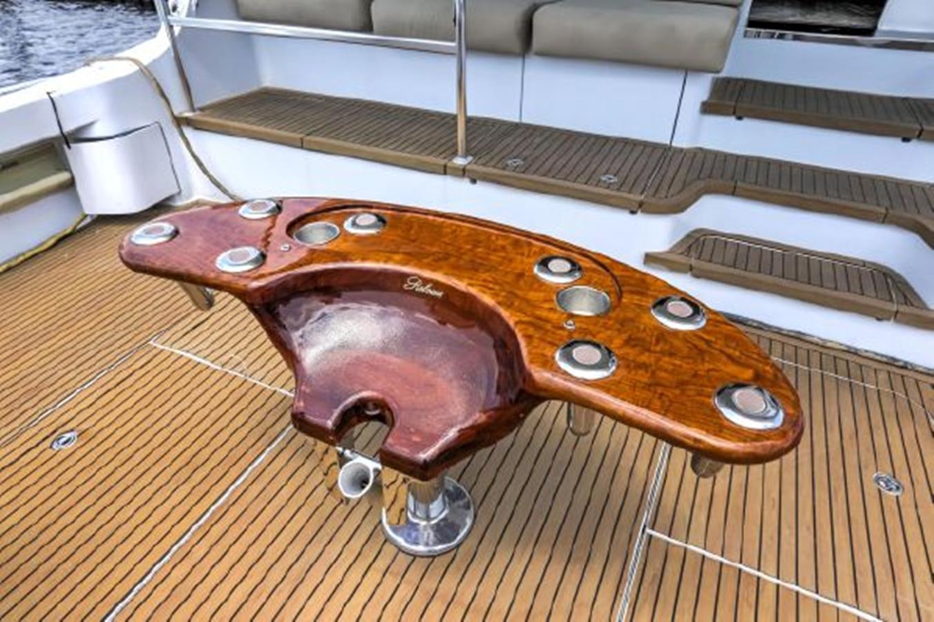 a wooden violin on a wooden surface aboard 2007 68 HATTERAS CONVERTIBLE Yacht for Sale