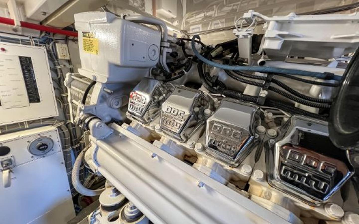 a close-up of a car engine aboard 2007 68 HATTERAS CONVERTIBLE Yacht for Sale