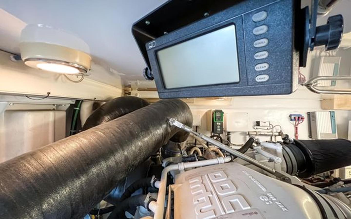 a computer monitor and keyboard aboard 2007 68 HATTERAS CONVERTIBLE Yacht for Sale