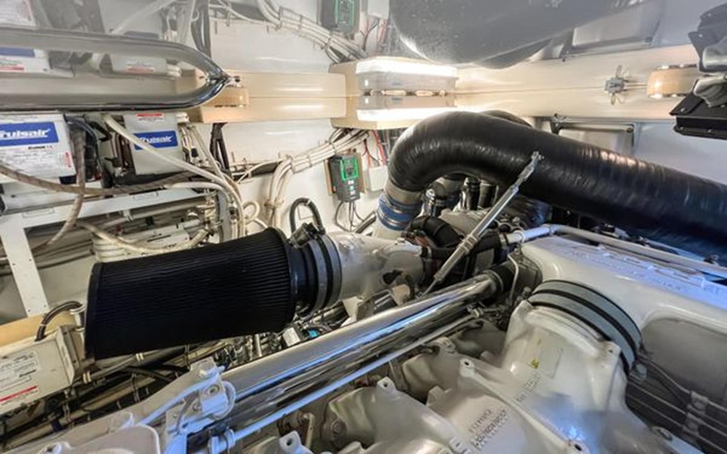 a car engine with a black cap aboard 2007 68 HATTERAS CONVERTIBLE Yacht for Sale