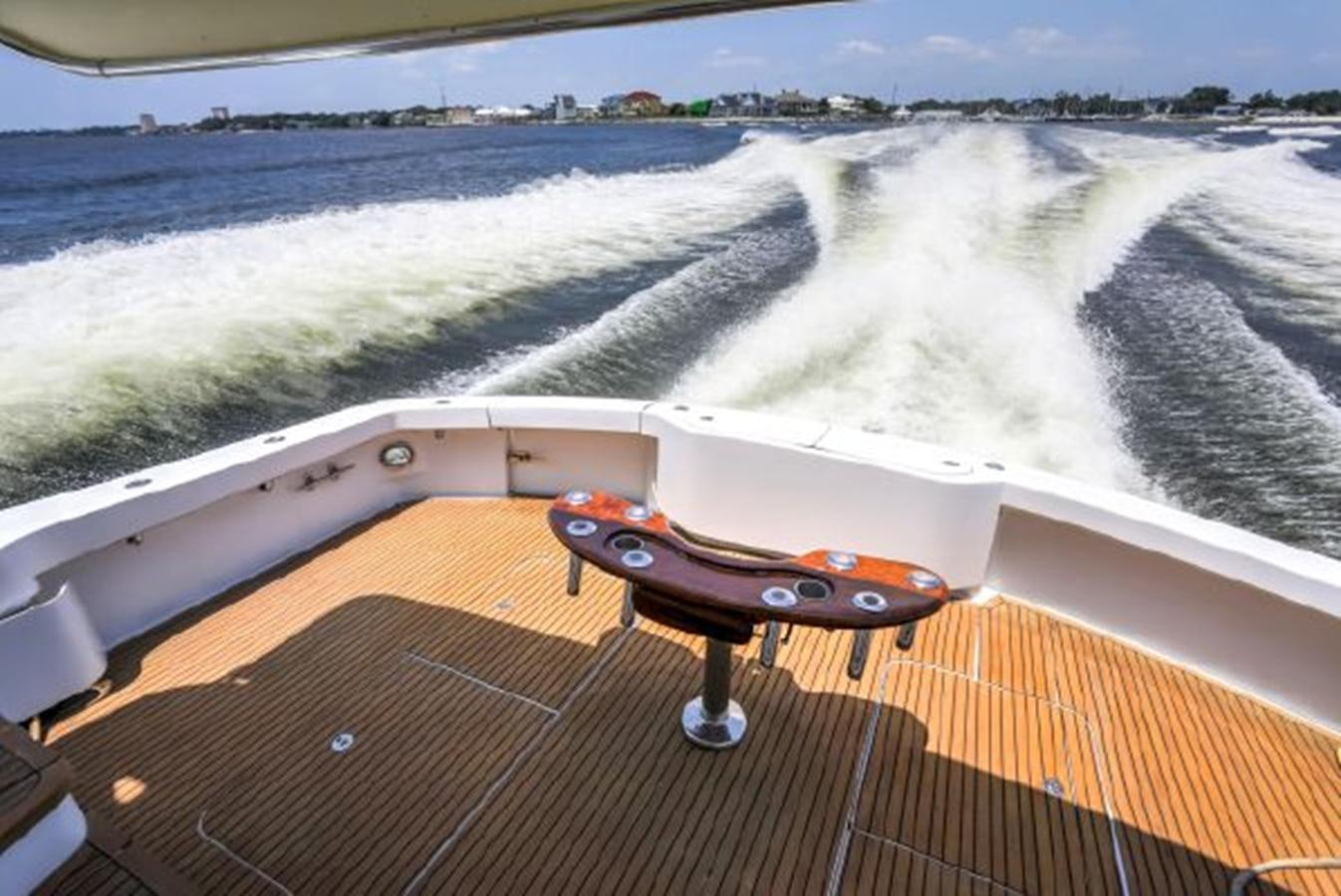 a black remote control on a boat aboard 2007 68 HATTERAS CONVERTIBLE Yacht for Sale