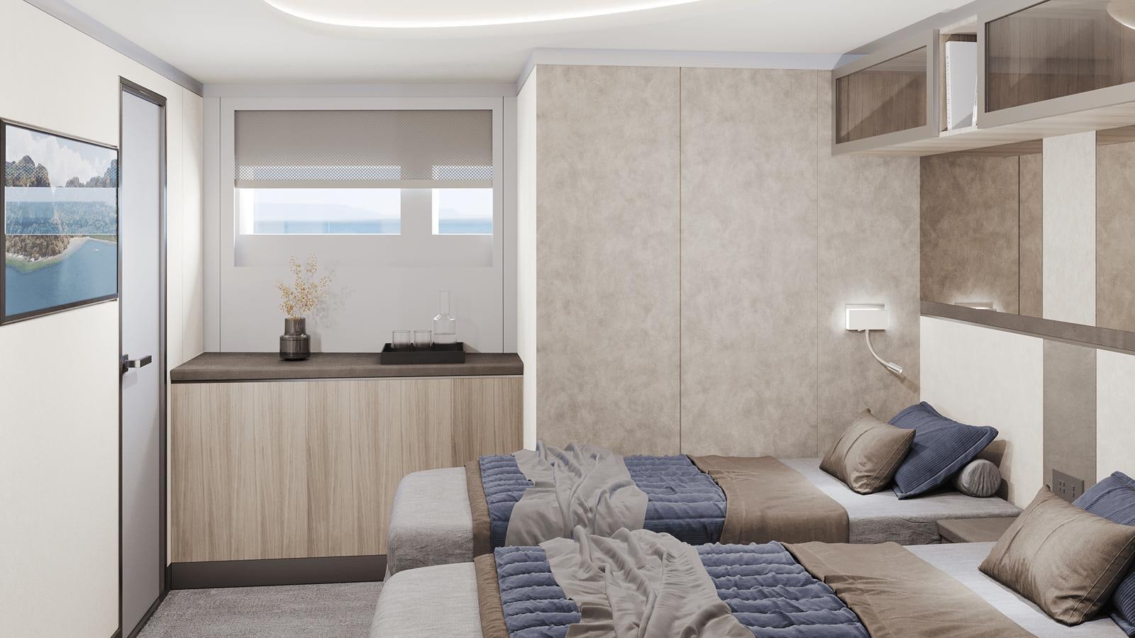 a room with a bed and a desk aboard BERING Yacht for Sale