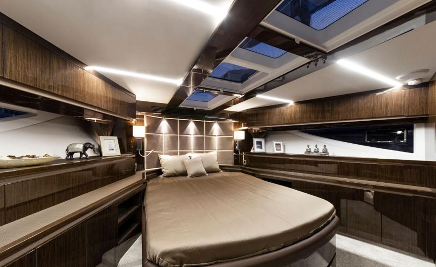 a room with a bed and a desk aboard GALEON 640 Yacht for Sale