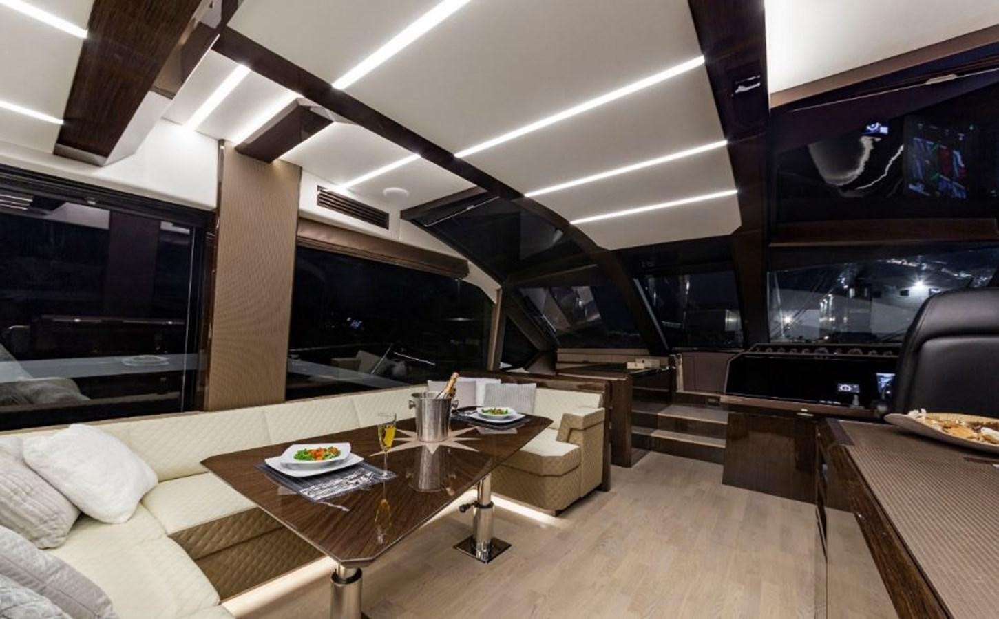 a living room with a large tv aboard GALEON 640 Yacht for Sale