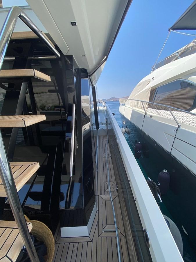 a staircase with metal railings aboard GALEON 640 Yacht for Sale