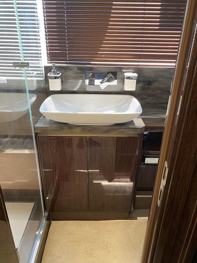 a bathroom with a sink and a shower aboard GALEON 640 Yacht for Sale
