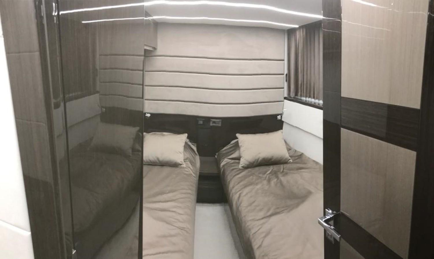 a room with two beds aboard GALEON 640 Yacht for Sale