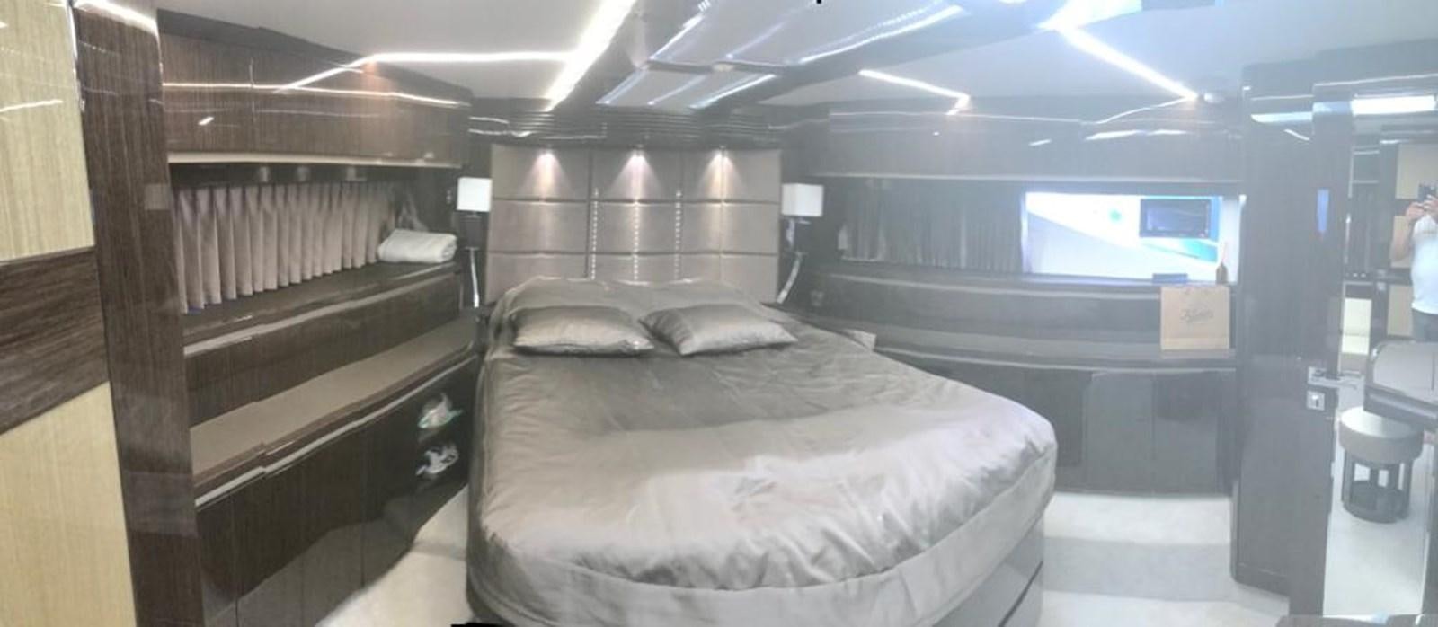 a room with beds and a tv aboard GALEON 640 Yacht for Sale
