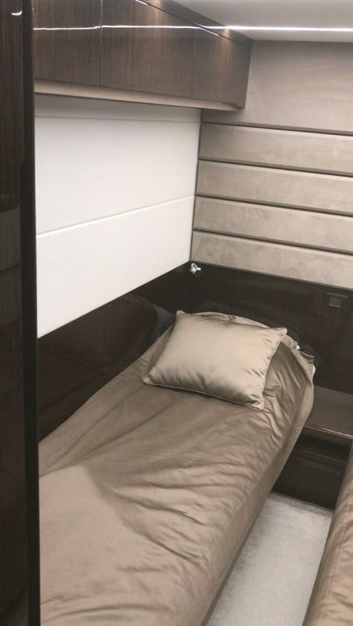 a bed with a pillow aboard GALEON 640 Yacht for Sale