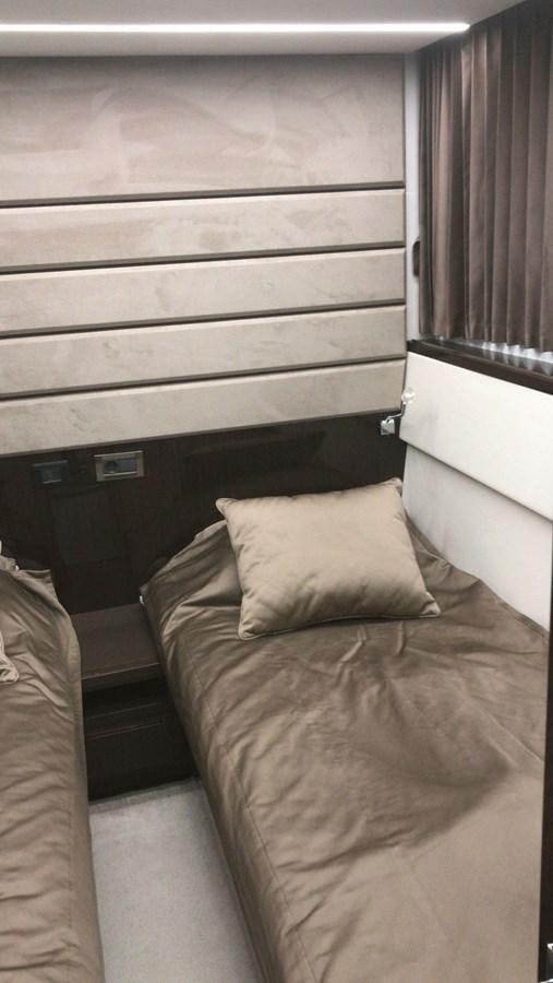 a bed with a pillow and a pillow on it aboard GALEON 640 Yacht for Sale