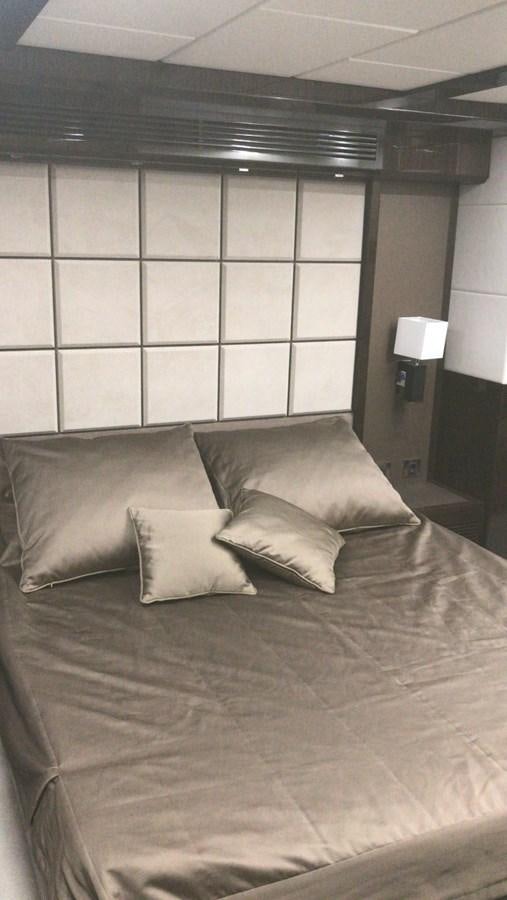 a bed with pillows aboard GALEON 640 Yacht for Sale