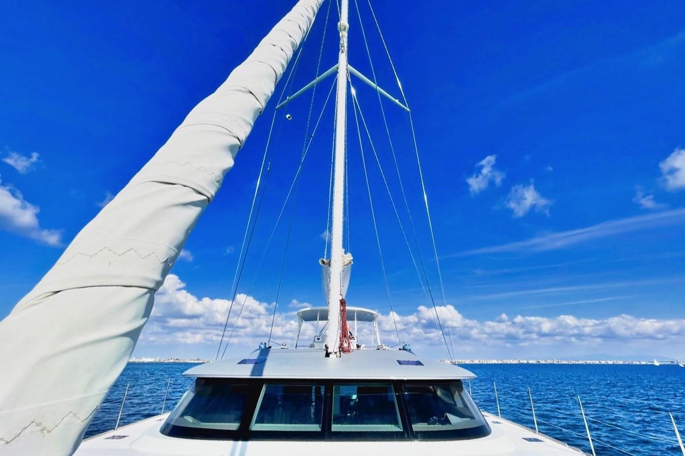 a boat on the water aboard ALKIMIA Yacht for Sale