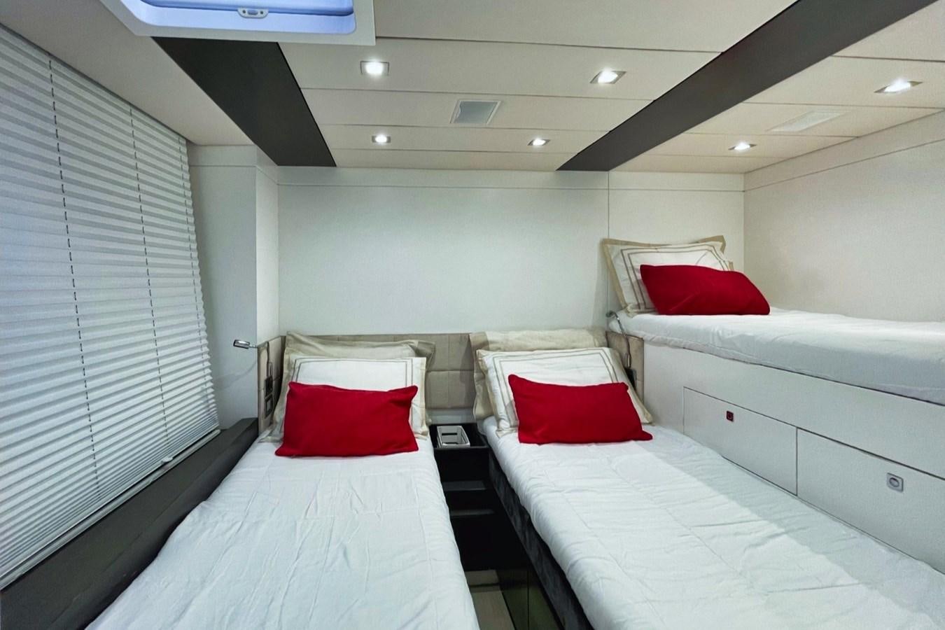 a room with two beds aboard ALKIMIA Yacht for Sale