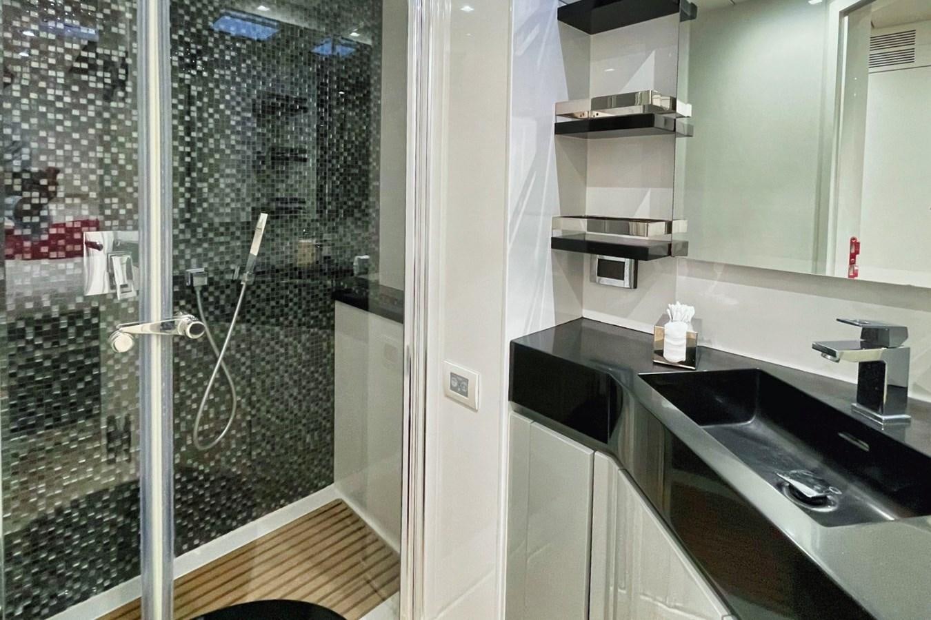 a kitchen with a glass door aboard ALKIMIA Yacht for Sale