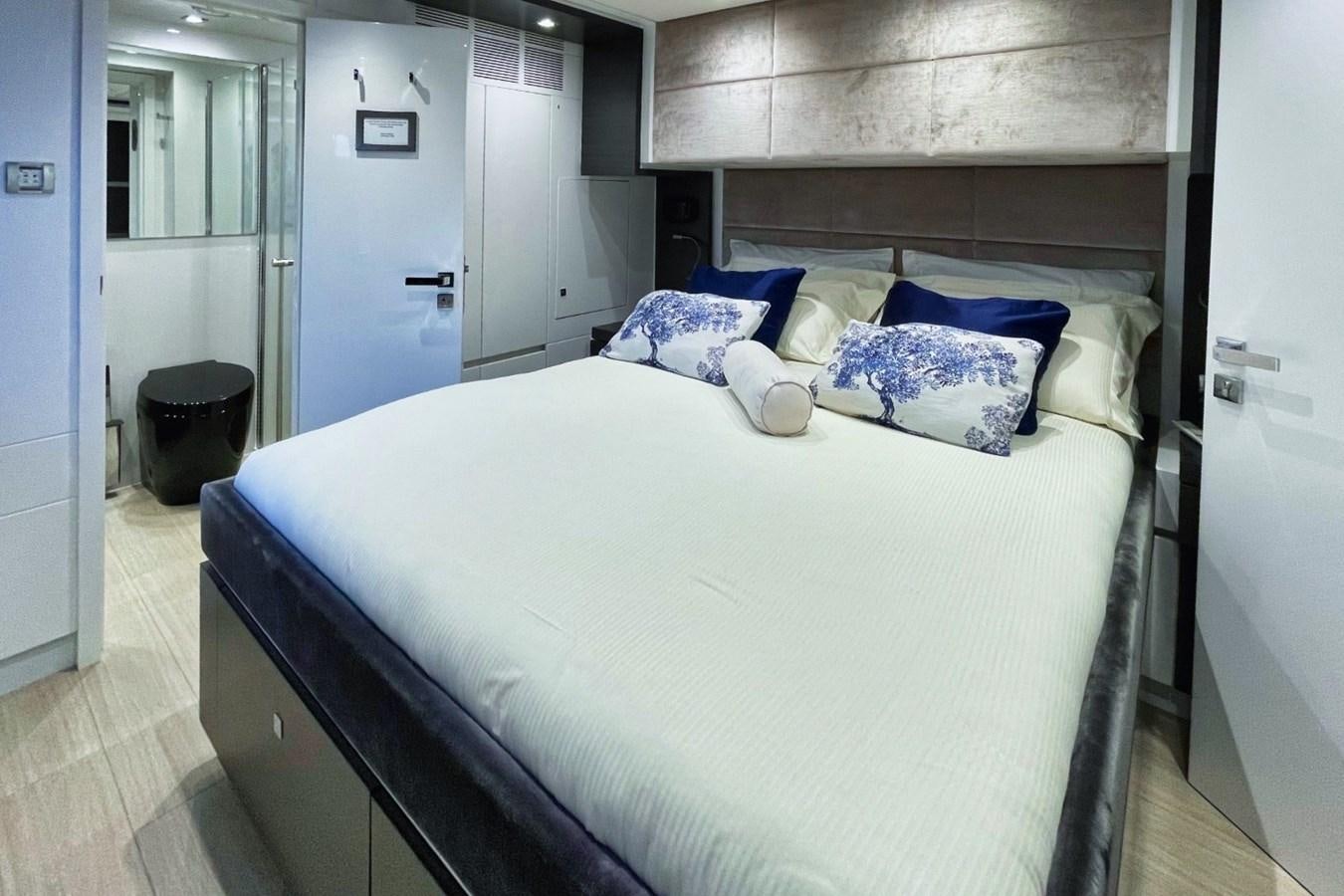 a bed in a room aboard ALKIMIA Yacht for Sale