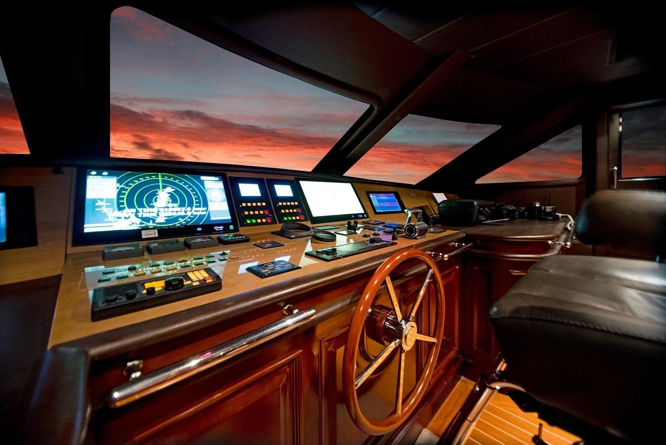 inside of a vehicle with monitors and screens aboard FORTIS Yacht for Sale
