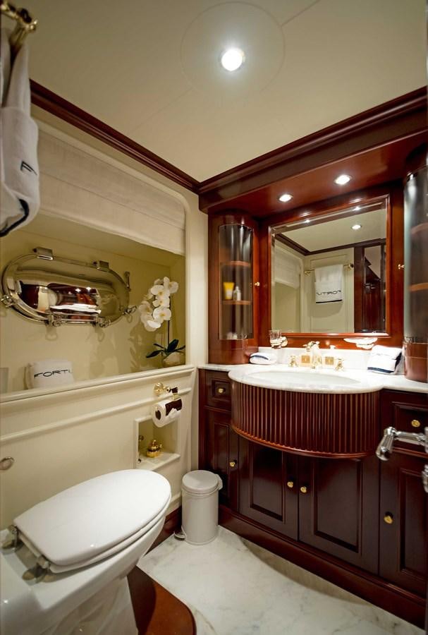 a bathroom with a sink and a toilet aboard FORTIS Yacht for Sale