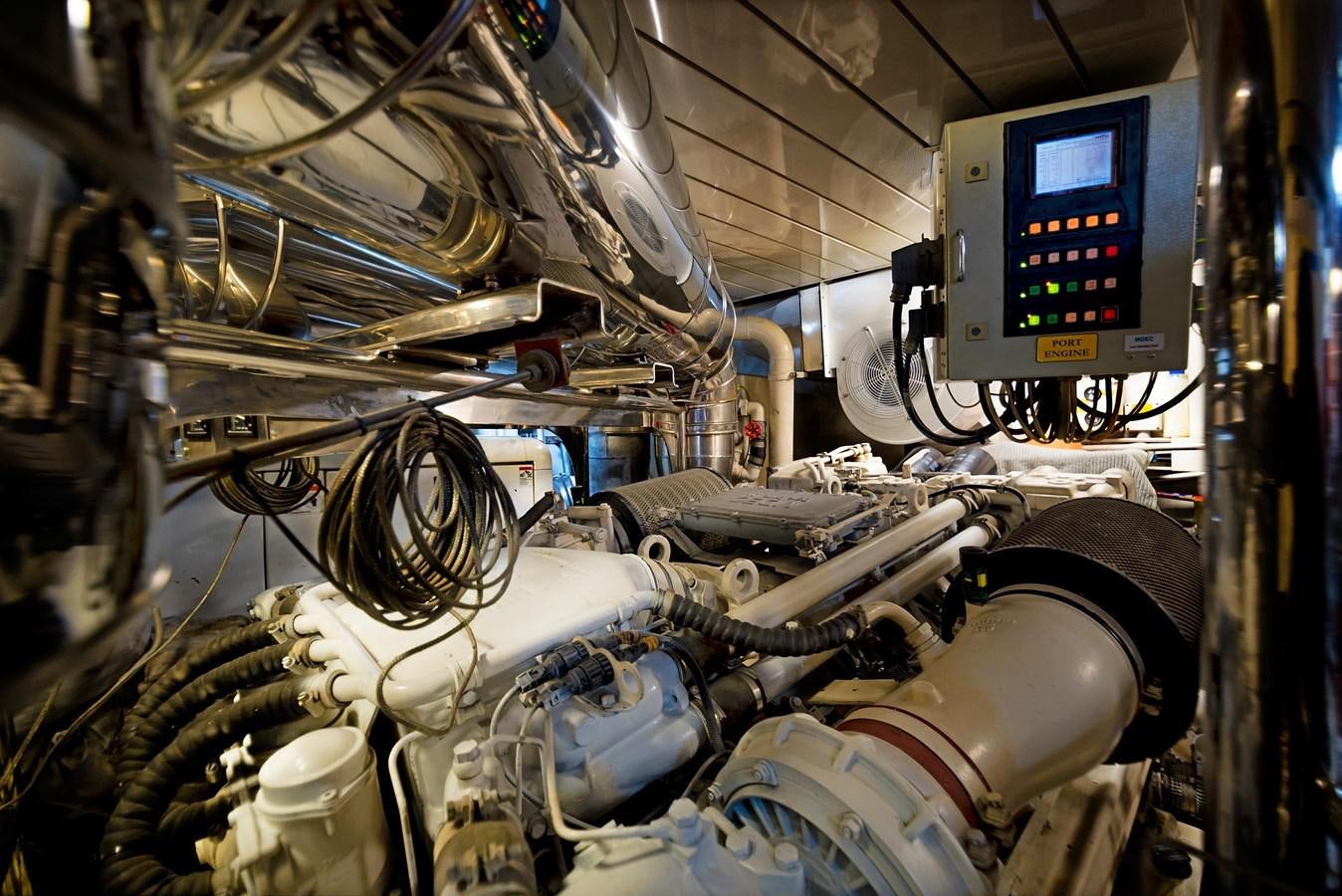 a computer monitor and a machine aboard FORTIS Yacht for Sale