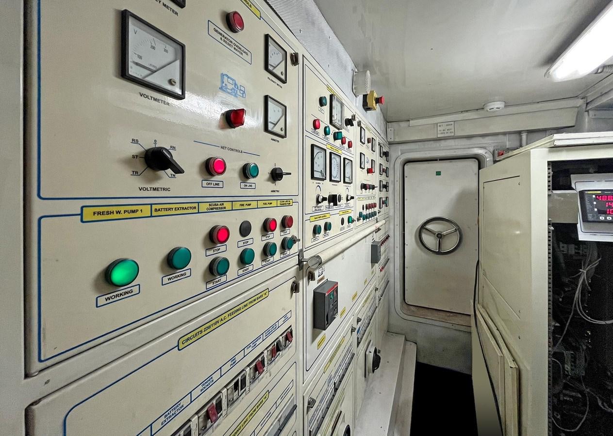 a white control panel with buttons aboard FORTIS Yacht for Sale