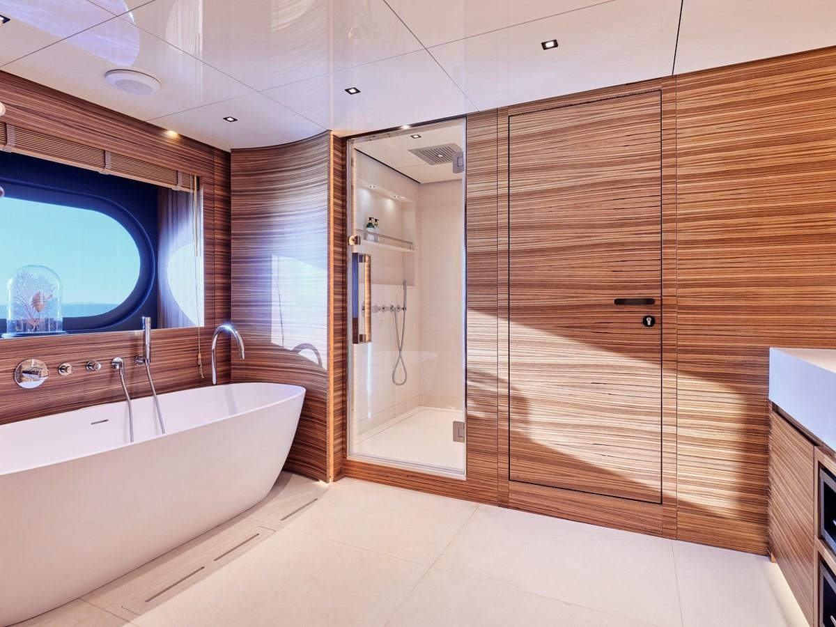 a bathroom with a large tub aboard MAGNA GRECIA Yacht for Sale
