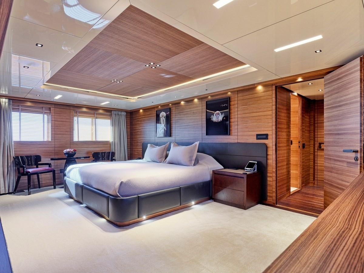 a large bed in a room aboard MAGNA GRECIA Yacht for Sale