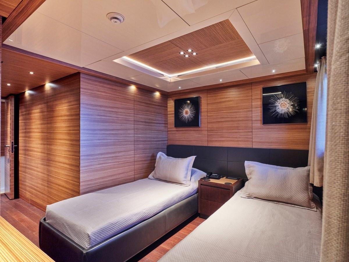 a room with two beds aboard MAGNA GRECIA Yacht for Sale