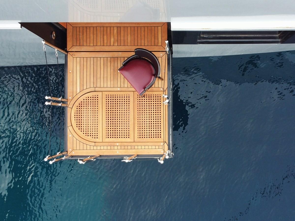 a wooden box on a blue surface aboard MAGNA GRECIA Yacht for Sale