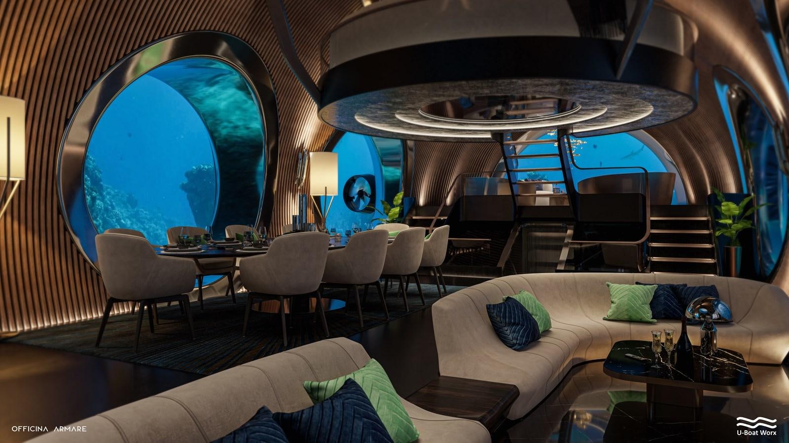 a room with a couch and a table with chairs and a large mirror aboard NAUTILUS Yacht for Sale