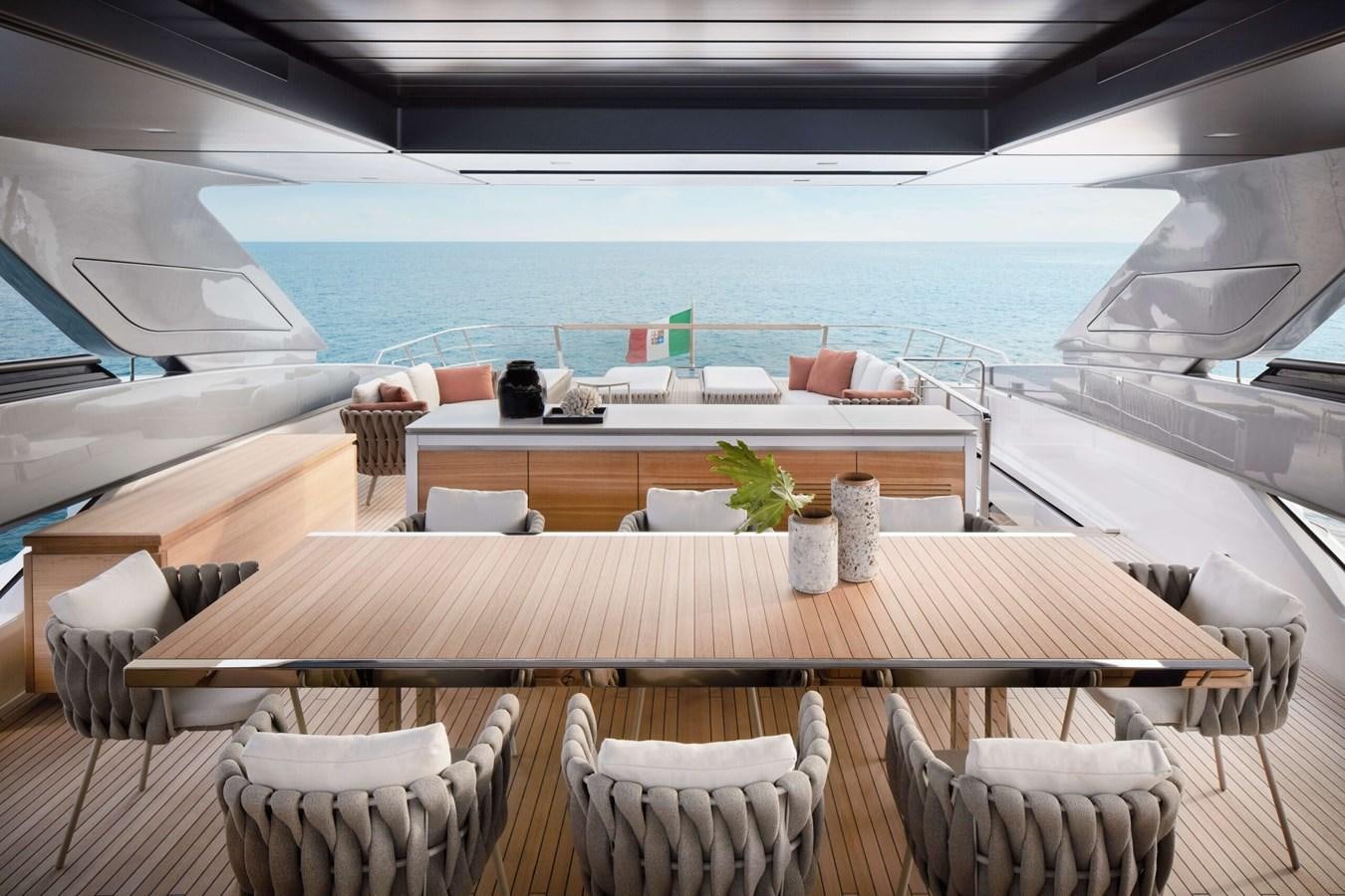 a room with a table and chairs aboard COOL Yacht for Sale