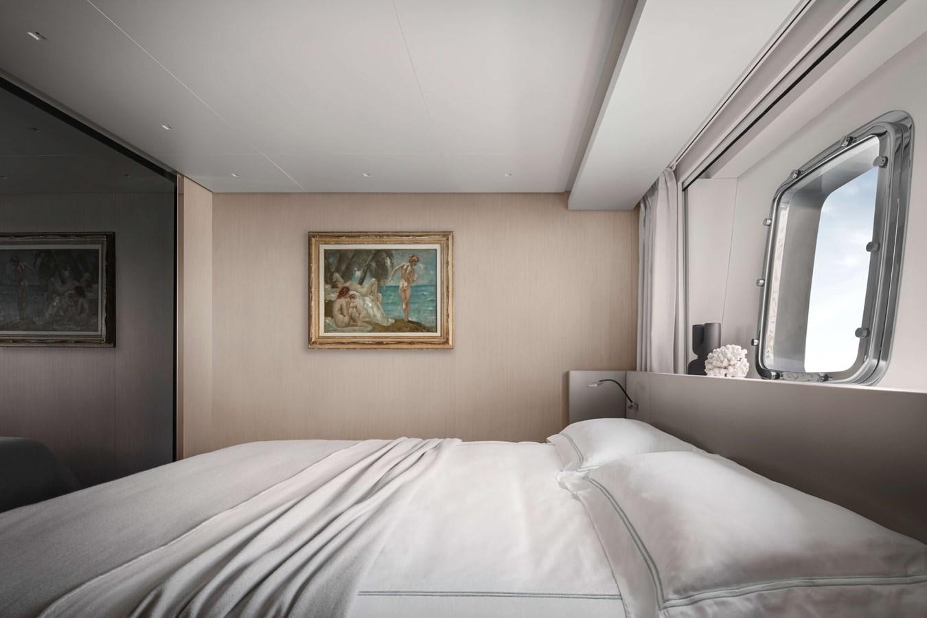 a bed with white sheets aboard COOL Yacht for Sale