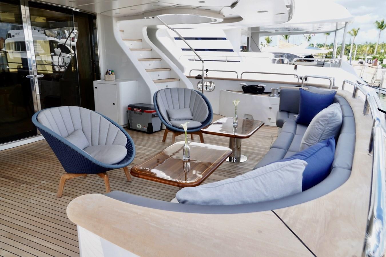 a room with a couch and a table and chairs aboard PAPAITO Yacht for Sale
