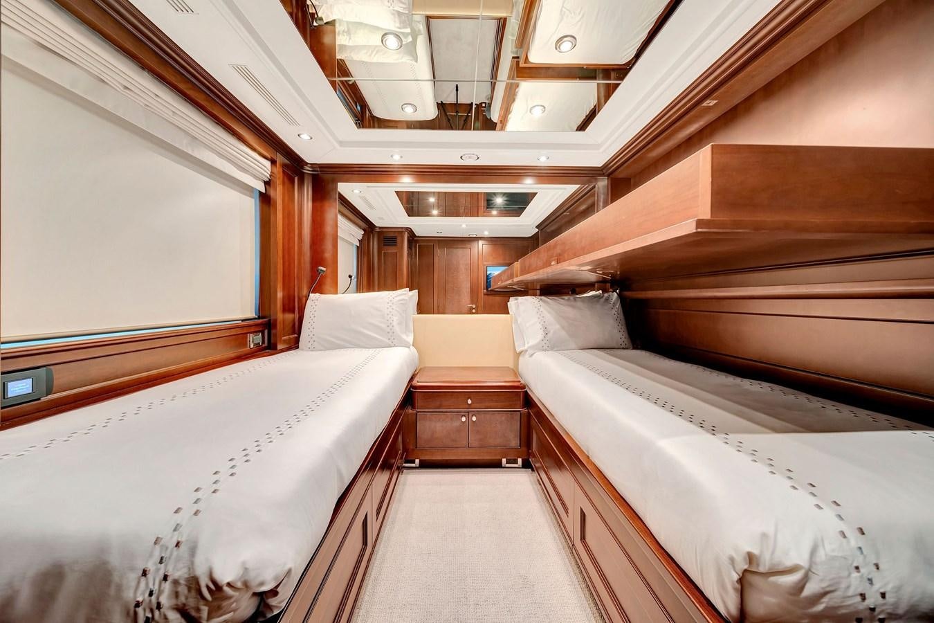 a room with bunk beds aboard PAPAITO Yacht for Sale