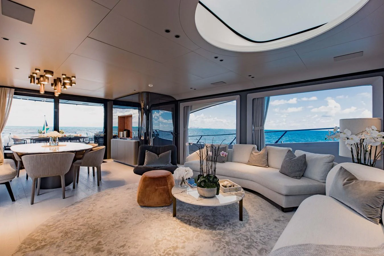 a living room with a large window aboard OFFLINE Yacht for Sale
