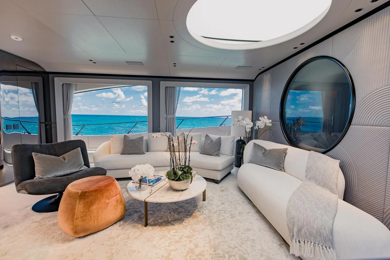 a living room with a large window aboard OFFLINE Yacht for Sale