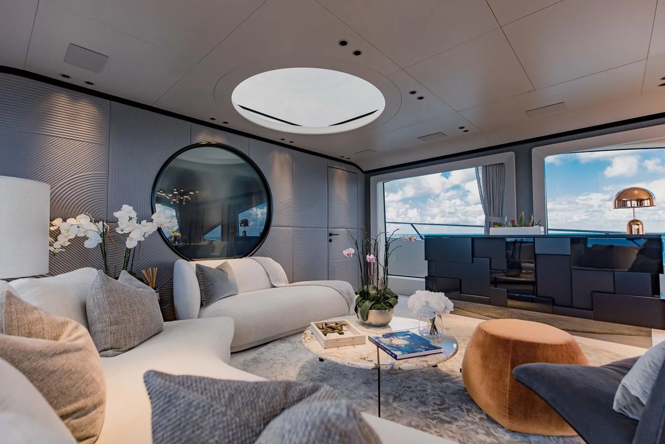 a living room with a large window aboard OFFLINE Yacht for Sale