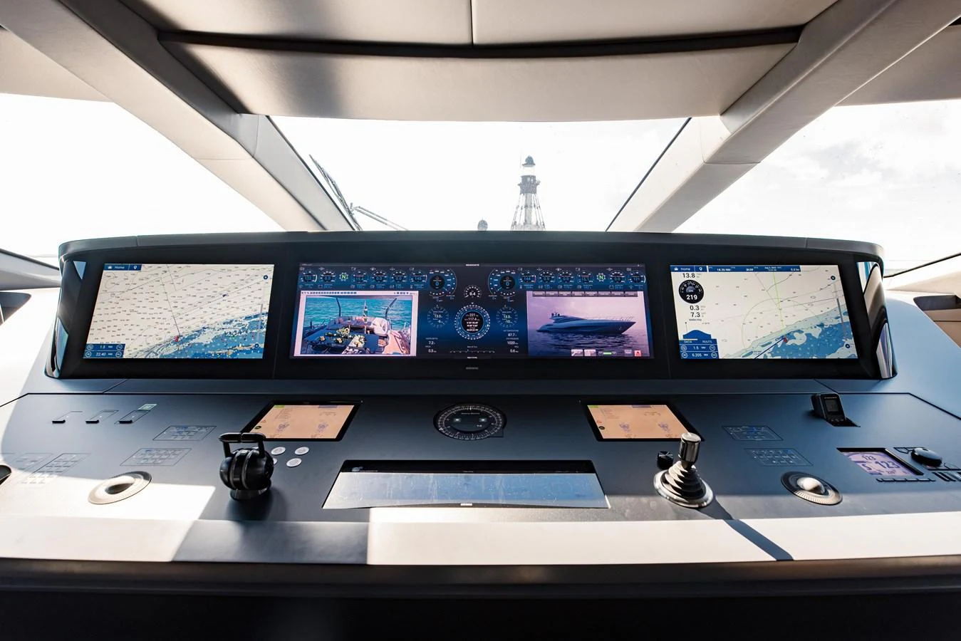 a computer monitor with a keyboard and mouse aboard OFFLINE Yacht for Sale