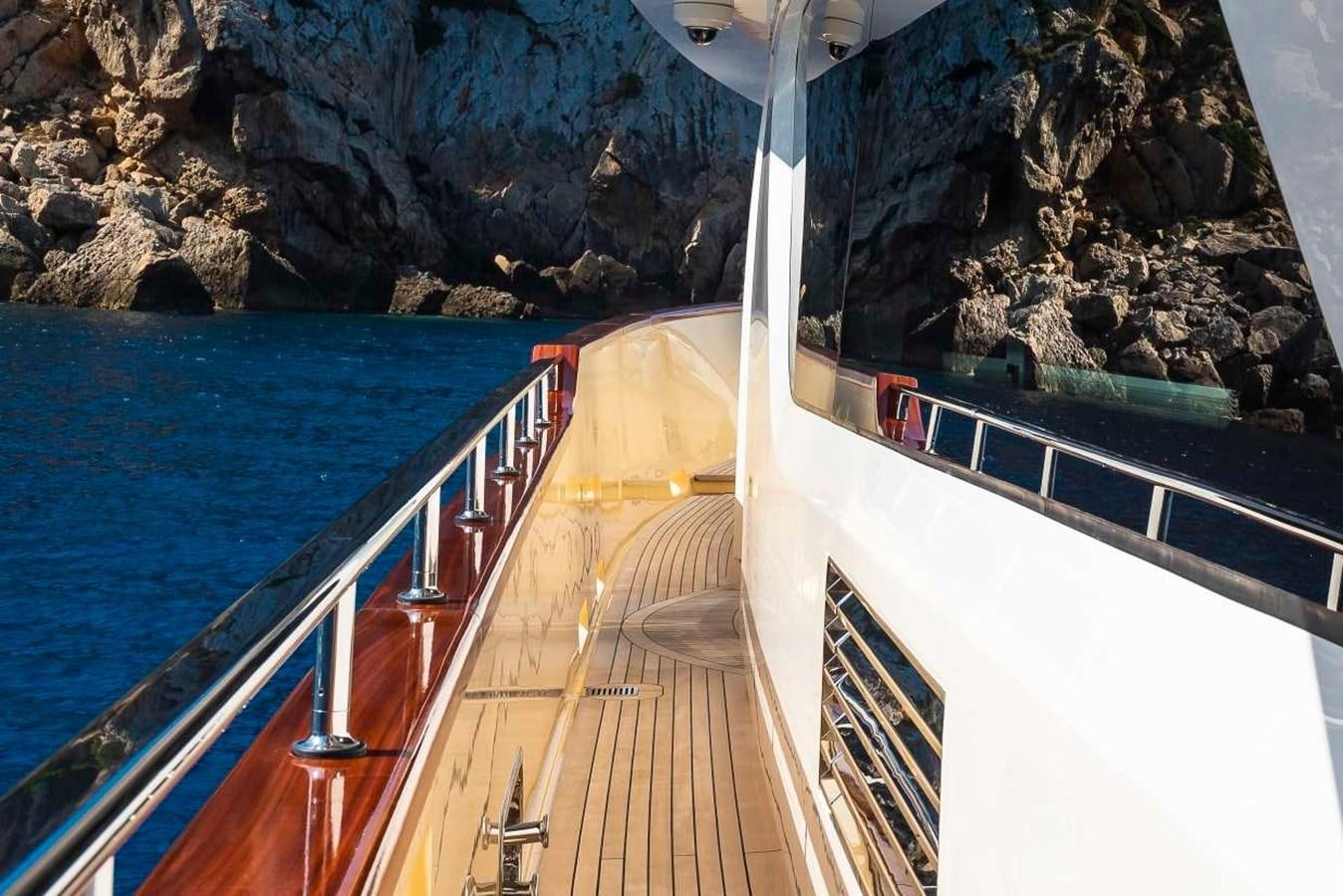 a long wooden bridge over water aboard 2011 SANLORENZO SD92 FLYBRIDGE Yacht for Sale