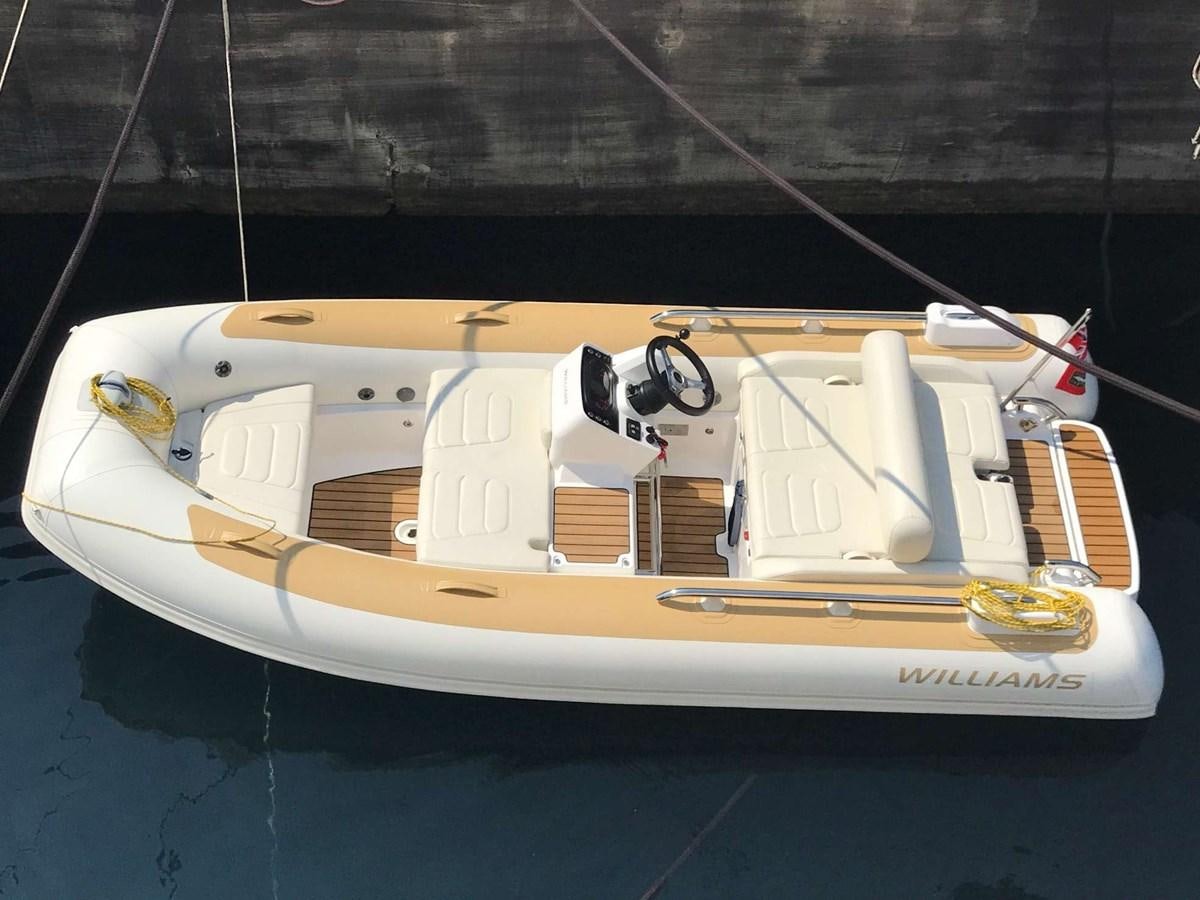 a white boat on water aboard 2011 SANLORENZO SD92 FLYBRIDGE Yacht for Sale