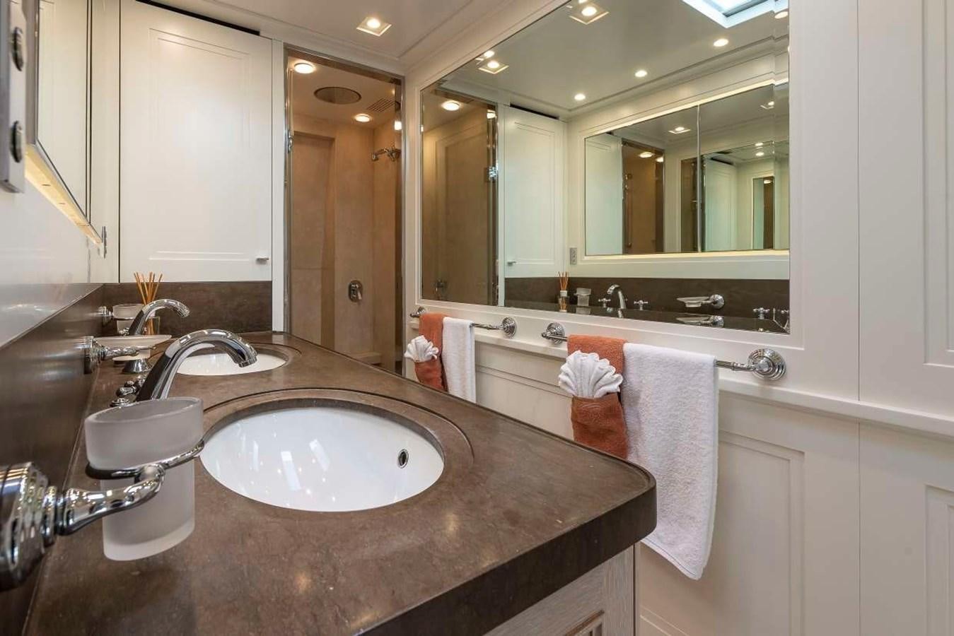 a bathroom with a large countertop aboard 2011 SANLORENZO SD92 FLYBRIDGE Yacht for Sale
