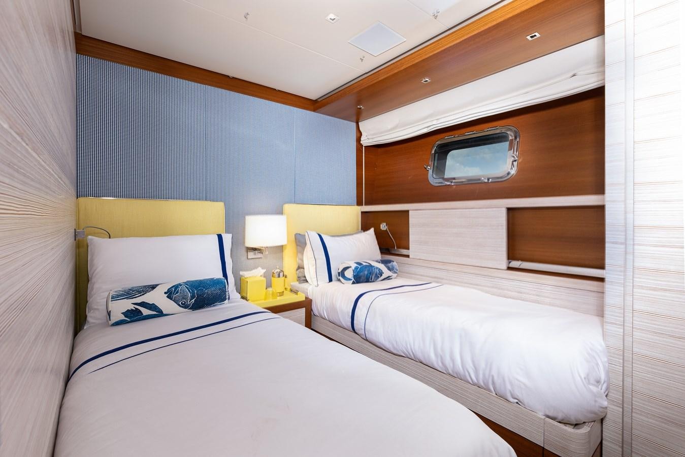 a room with two beds aboard THE GREAT ESCAPE Yacht for Sale