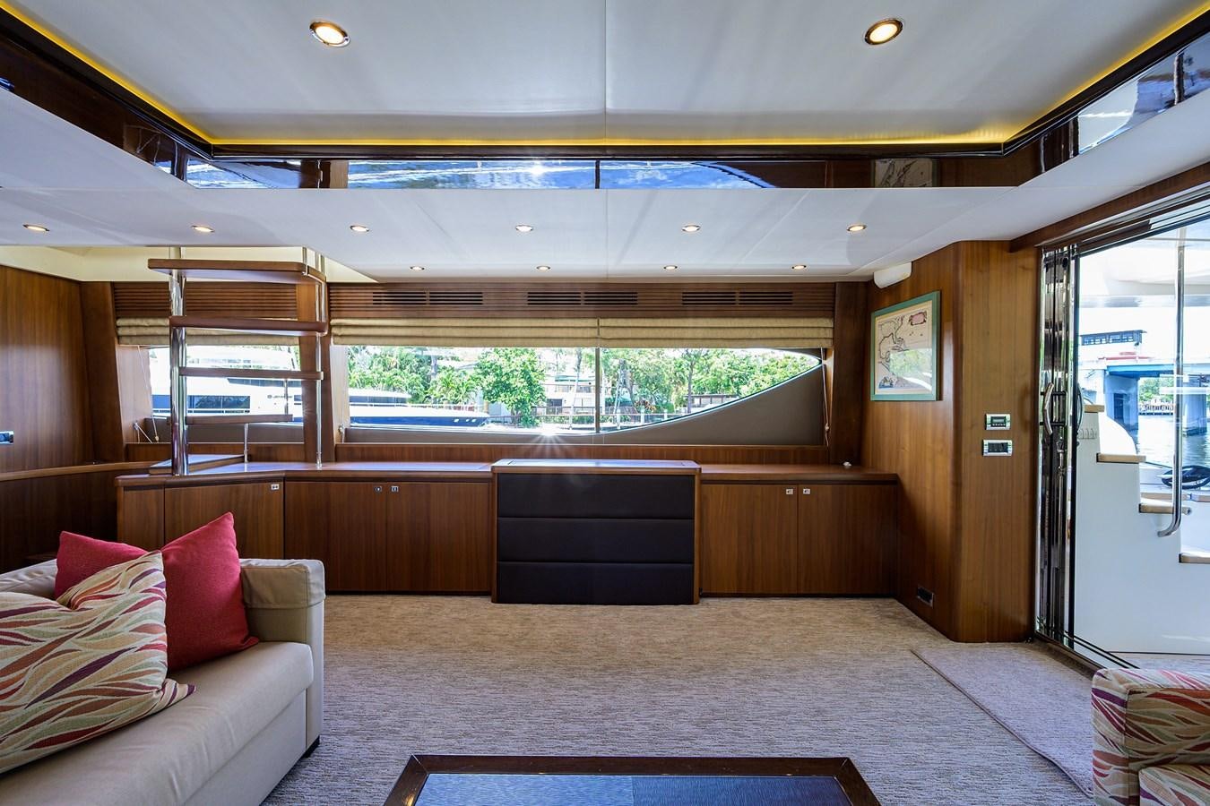 a room with a couch and a bed aboard FREUDIAN SLIP Yacht for Sale