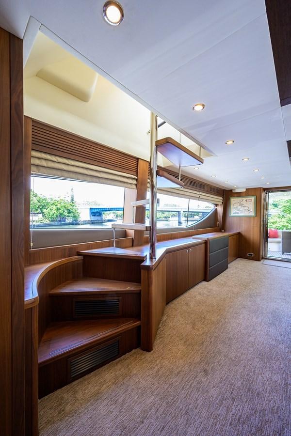 a room with a wood floor and a wood bench aboard FREUDIAN SLIP Yacht for Sale