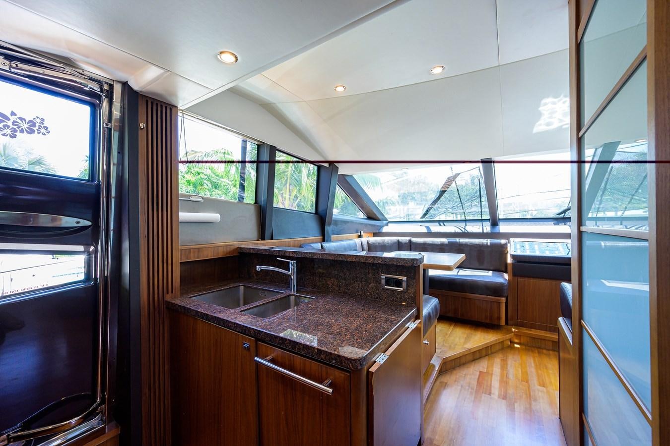 a kitchen with a counter and sink aboard FREUDIAN SLIP Yacht for Sale