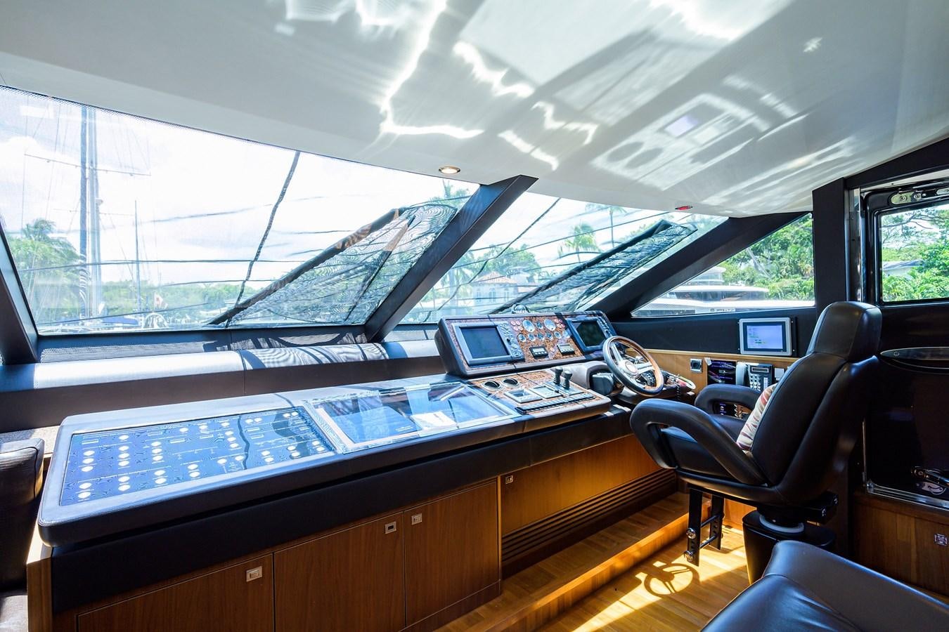 a piano with a keyboard and a laptop on it aboard FREUDIAN SLIP Yacht for Sale