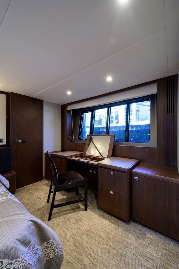 a room with a desk and a computer aboard FREUDIAN SLIP Yacht for Sale