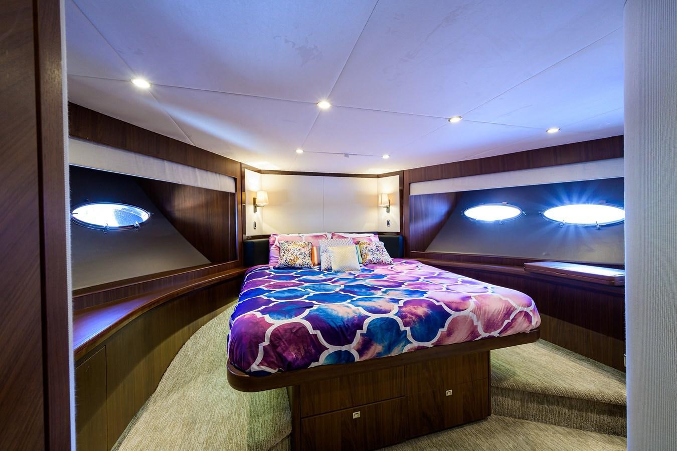 a bed in a room aboard FREUDIAN SLIP Yacht for Sale